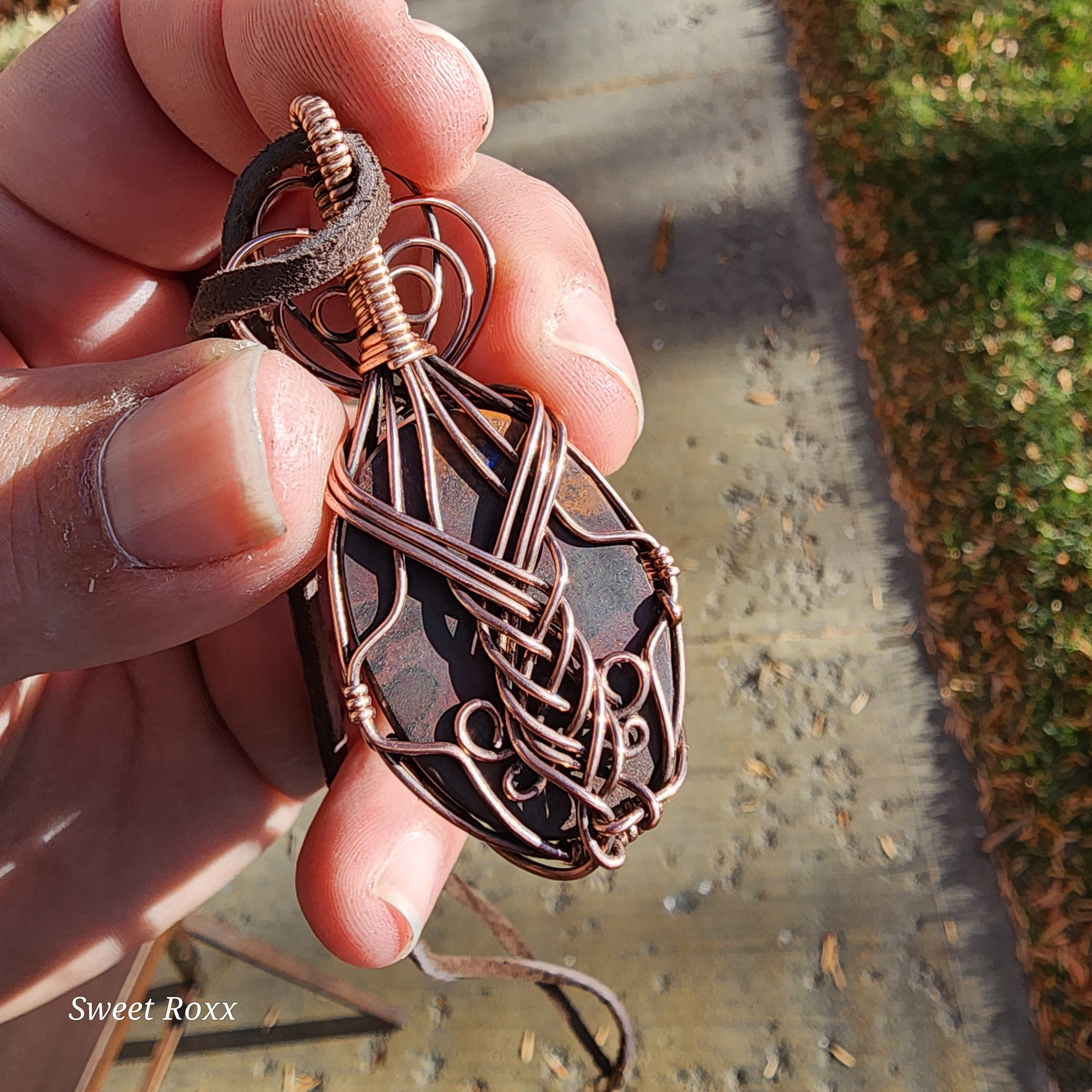 Boulder Opal wrapped in Vintage Copper