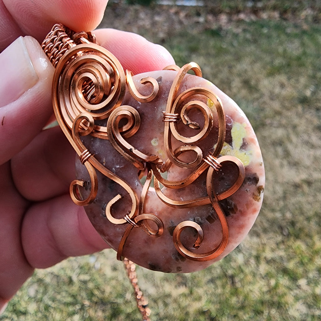 Pink Granite Doughnut Medallion Wrapped in Copper