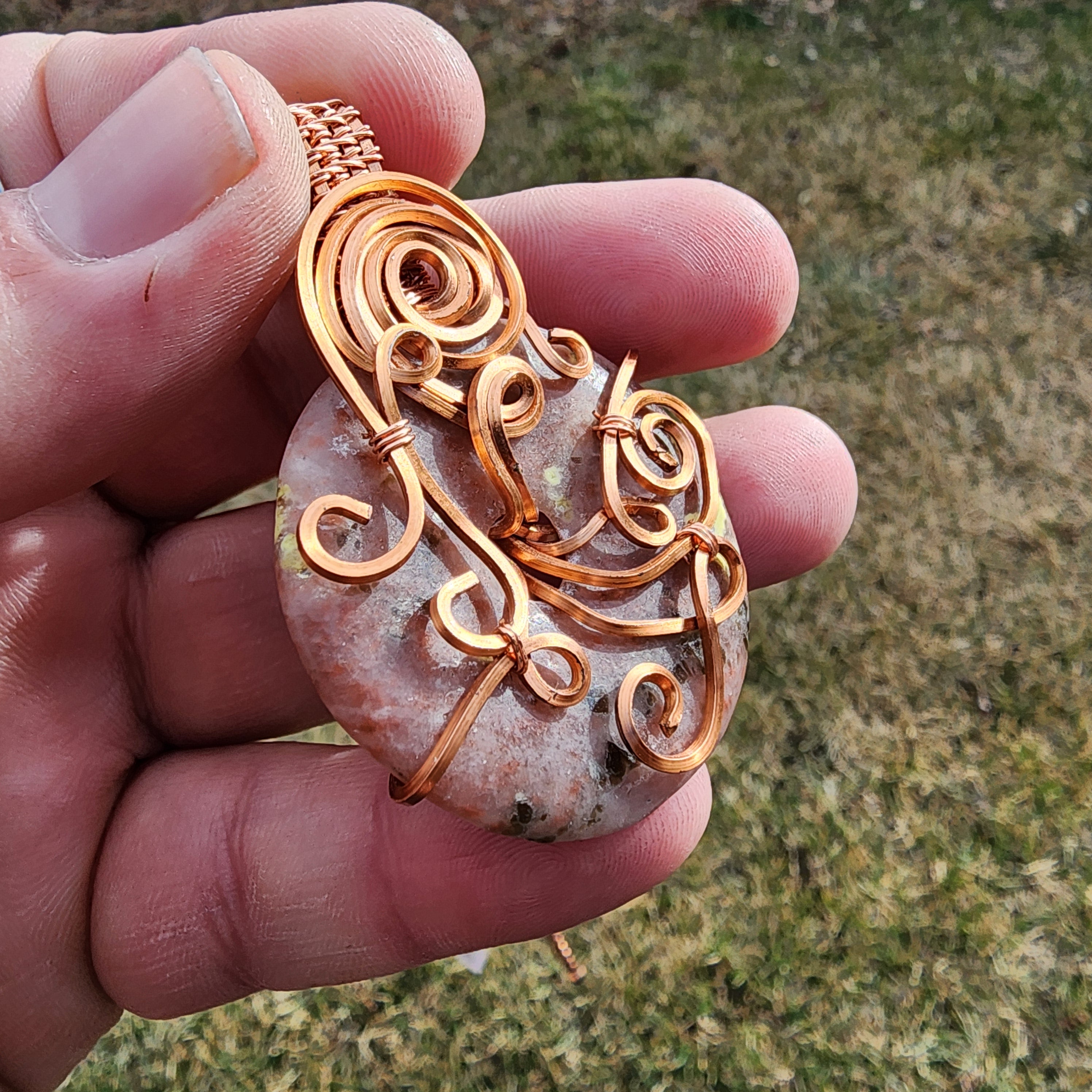 Pink Granite Doughnut Medallion Wrapped in Copper