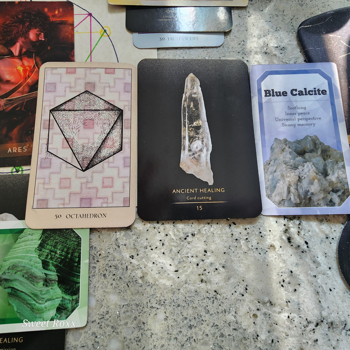 Germination (Bottom Right / 4 o'clock): Foundation & Clearing

Sacred Geometry: Octahedron (inner child)

Master Crystal Deva: Ancient Healing (cord cutting)

Gaia’s Wisdom: Blue Calcite

Core Message: The journey begins by releasing old emotional cords and stored friction. The Octahedron balances the upper and lower energy centers, while Ancient Healing cuts past attachments. Blue Calcite softens the throat chakra, giving the heart a peaceful voice to express boundaries without fear.